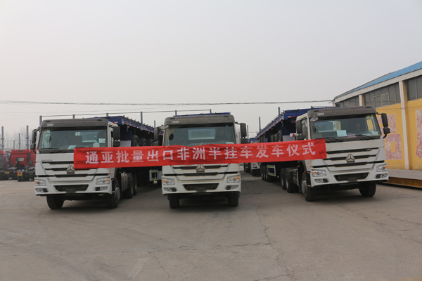 通亞汽車(chē)批量倉(cāng)柵半掛車(chē)遠(yuǎn)赴大洋彼岸助力非洲建設(shè)